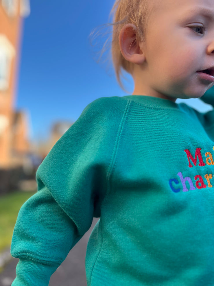 Embroidered Main Character rainbow Kids emerald sweater