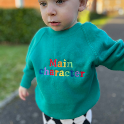 Embroidered Main Character rainbow Kids emerald sweater